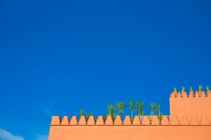 lowangle photo of brown concrete wall during daytime